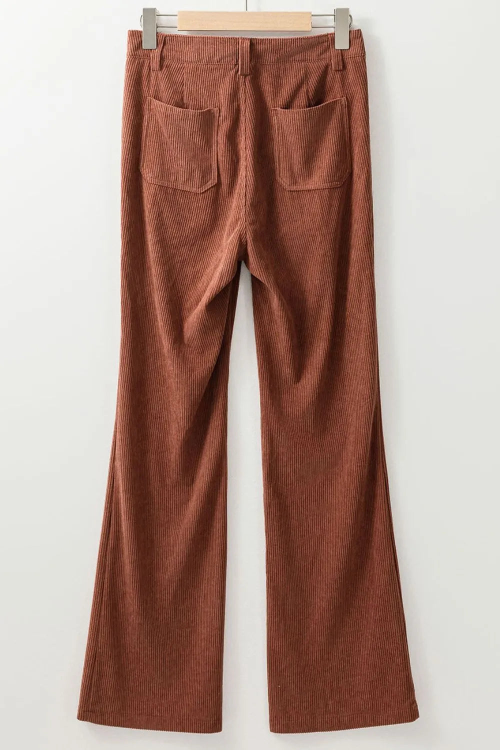 Women’s high-waist corduroy flared pants in rust with square back pockets