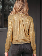 Gold sequined blouse with ruched back and balloon sleeves