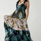 Floral tiered maxi dress in navy blue hues with ruffled mixed print layers