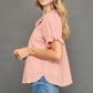 Blush Peter Pan collared blouse with ruffled sleeves and dotted texture