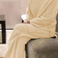 Cream-colored ribbed knit relaxed fit top and pants sweater set plus size