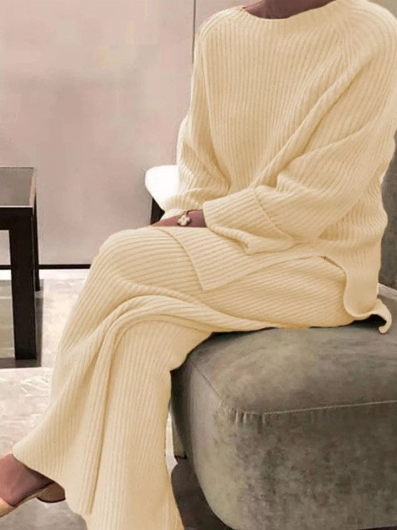 Cream-colored ribbed knit relaxed fit top and pants sweater set plus size