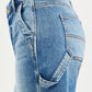 Back view of RISEN High Rise Bermuda light-wash blue denim with cargo strap detail