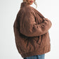 Brown quilted Dixie Jacket with velvety texture and elastic cuffs