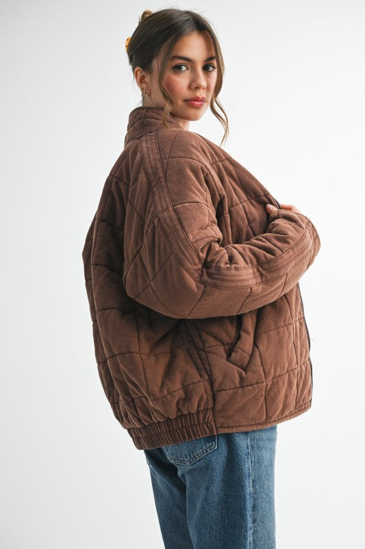 Brown quilted Dixie Jacket with velvety texture and elastic cuffs