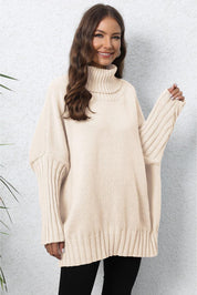 Cream oversized turtleneck sweater with ribbed cuffs and hem