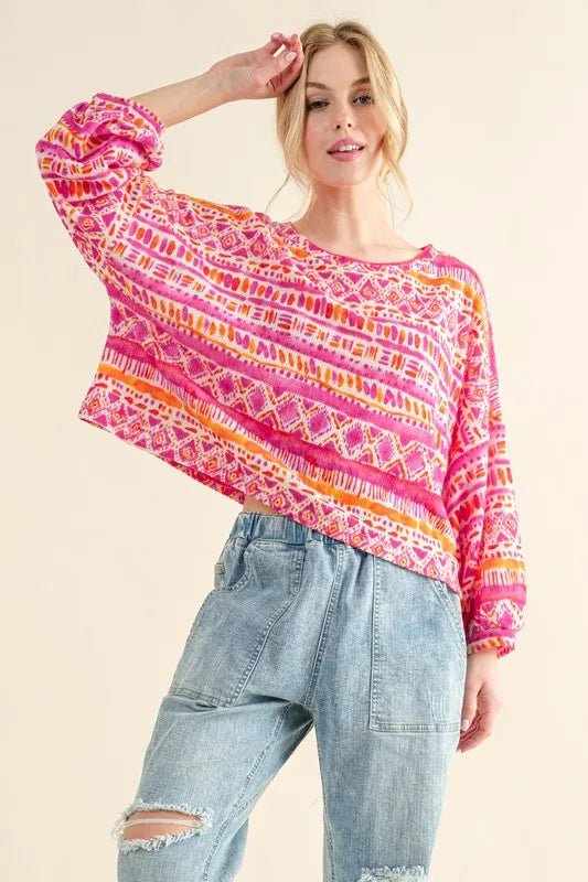 Pink and orange patterned And The Why Cozy long-sleeve casual top