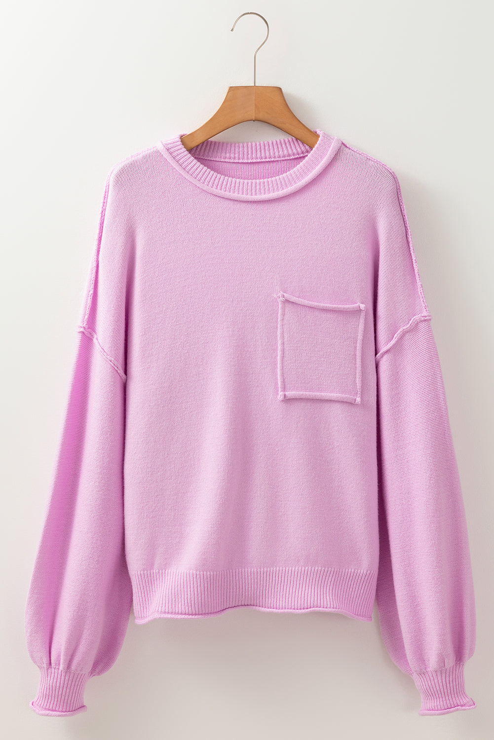 Lavender knit sweater with pink raw edge ribbed drop shoulder