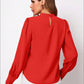 Vibrant red ruched mock neck long sleeve blouse with puffed sleeves