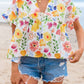 Floral boxy fit ruffled short sleeve blouse with vibrant blossoms