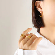 Gold Heart One Size Titanium Steel Geometric Huggie Earrings | Earrings Daverri Fashions