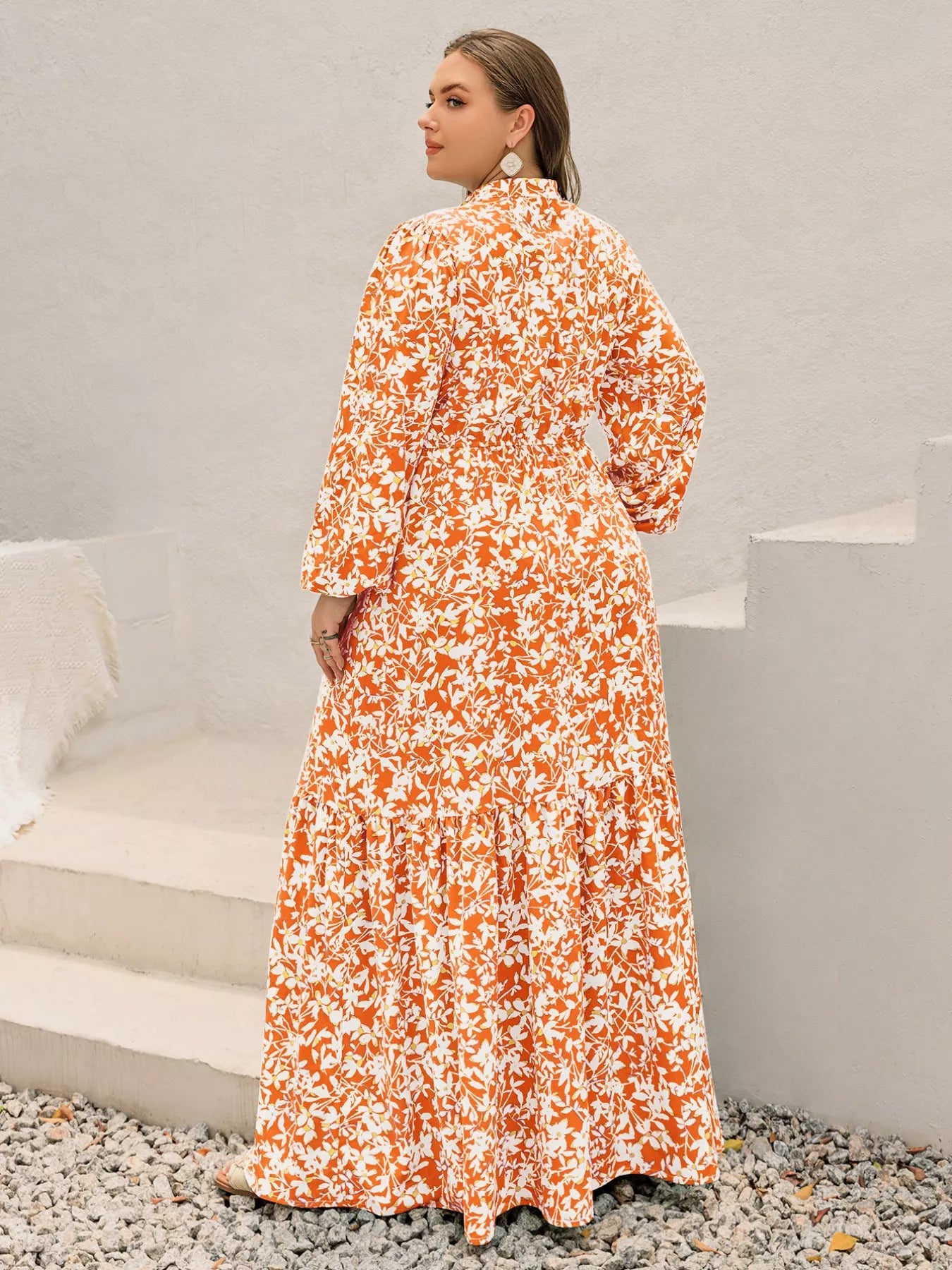 Plus size boho floral print maxi dress in orange and white with long sleeves