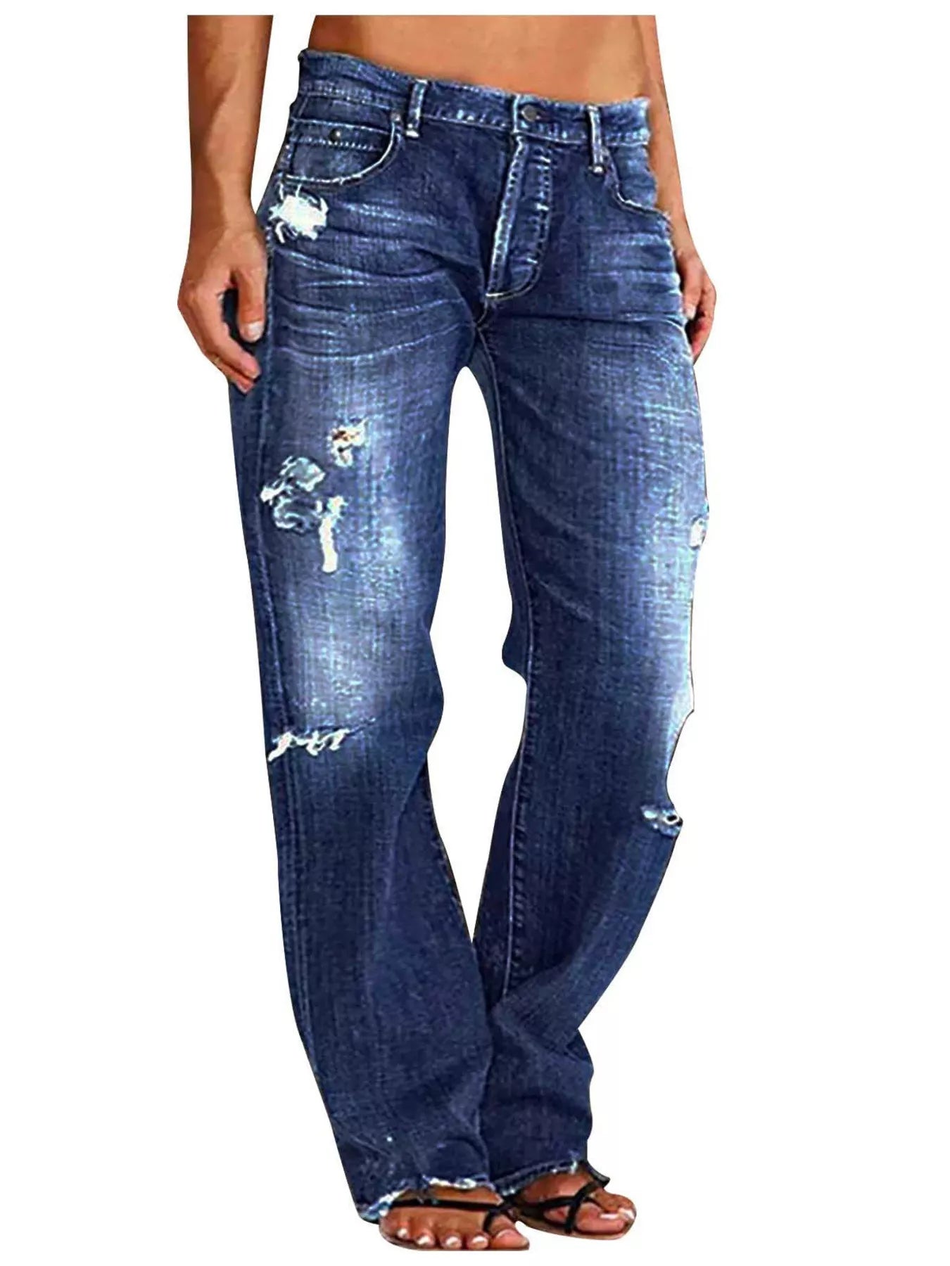 Distressed loose fit blue denim jeans with ripped frayed details