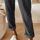 Dark gray corduroy Daverri Fashions pants with rolled cuffs