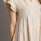 Cream Umgee tiered linen A-line mini dress with ruffled sleeves