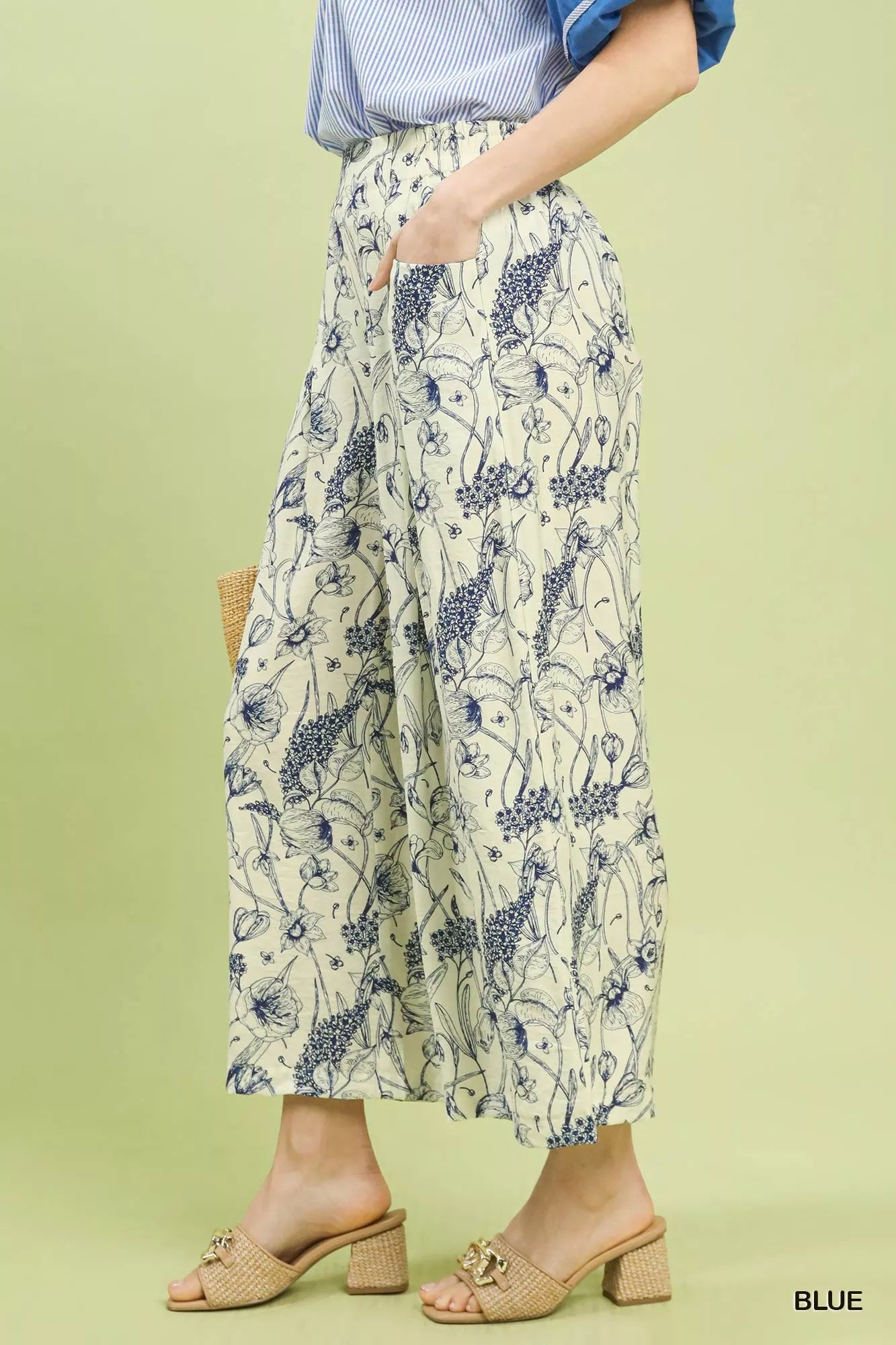 Cream-colored Umgee two-tone floral print wide-leg pants with elastic waistband and pockets