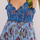 Floral tiered maxi dress in blue purple print with olive green satin straps