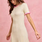 SO ME cream ribbed knit mini dress with pink ruffled trim