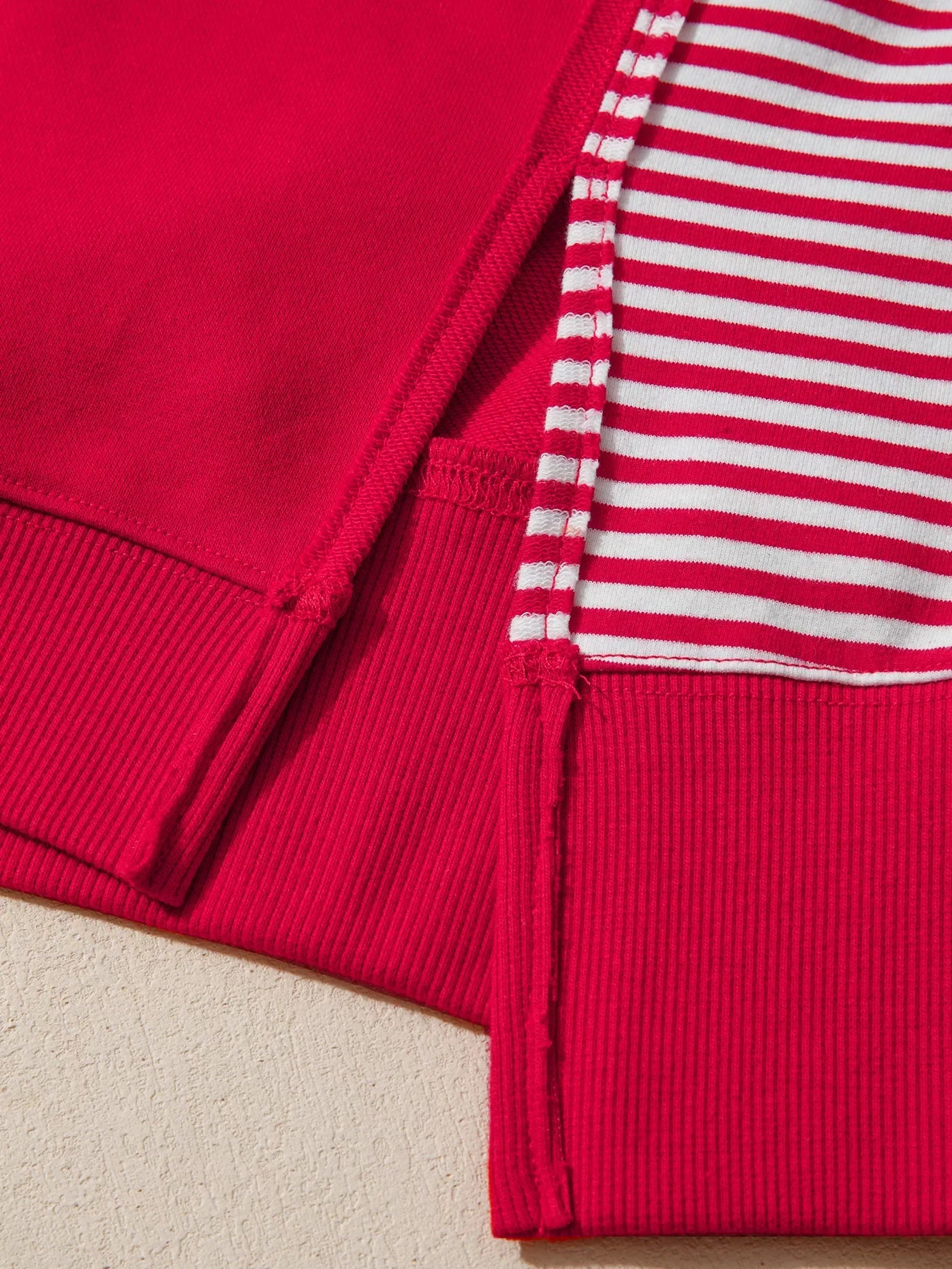 Red and white striped patchwork sleeve colorblock sweatshirt