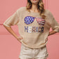 BiBi sequin American flag sunglasses knit cover-up with beige sweater and Merica lettering