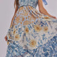 Floral tiered maxi dress in soft blue cream print with gold accents