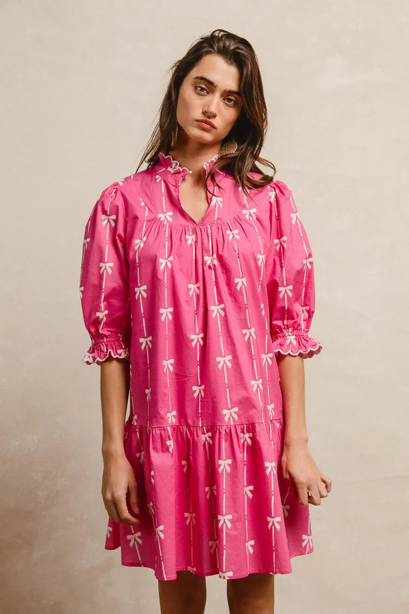 Vibrant pink BiBi ribbon pattern scallop edge short sleeve dress with white bows and puffed sleeves