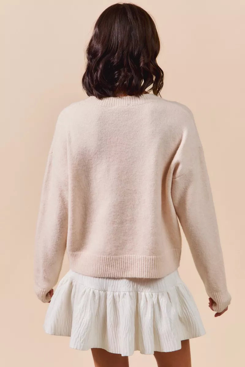 SO ME embroidered ribbon round neck knit sweater in soft off-white
