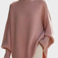 Women’s soft pink oversized batwing sleeve knit sweater with ribbed cuffs