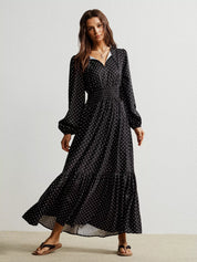 Black polka dot long sleeve V-neck maxi dress by Free People