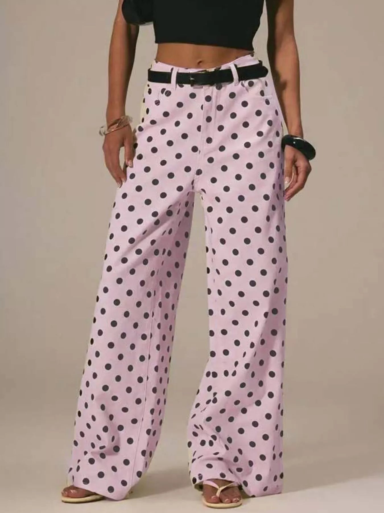 Daverri Polka Dot Wide Leg Jeans in light pink with black polka dots and belt