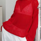 Vibrant red boat neck dropped shoulder knit sweater with sheer mesh chest panel