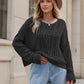 Black cable-knit round neck dropped shoulder long sleeve sweater