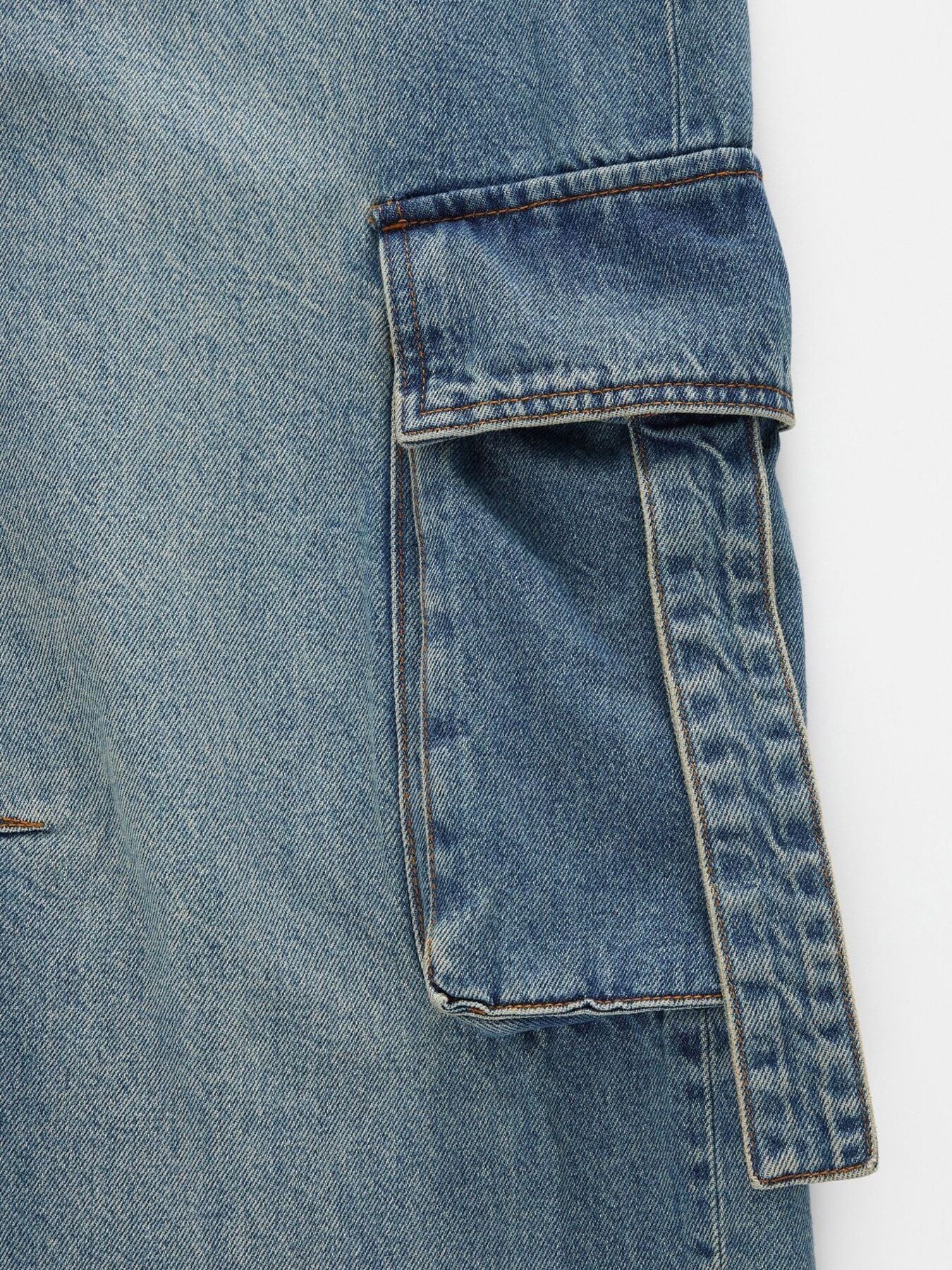 Blue denim cargo pocket with reinforced stitching on Vintage Wash Wide Leg Cargo Jeans