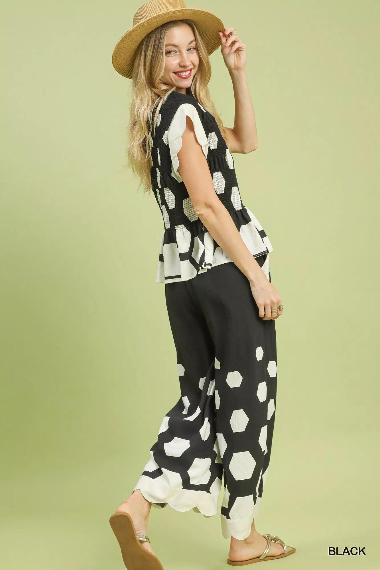 Black and white hexagonal Umgee peplum top with ruffled hem