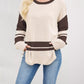 Beige and brown color-blocked knit sweater with ribbed cuffs and side slit