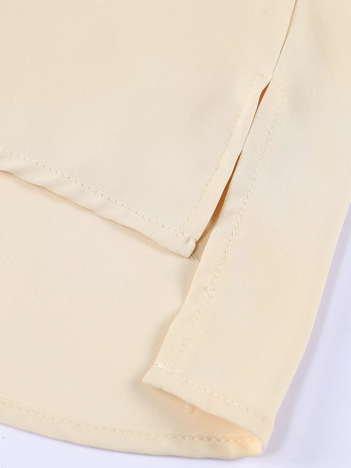 Women’s oversized 3/4 sleeve button-up shirt in pale yellow fabric