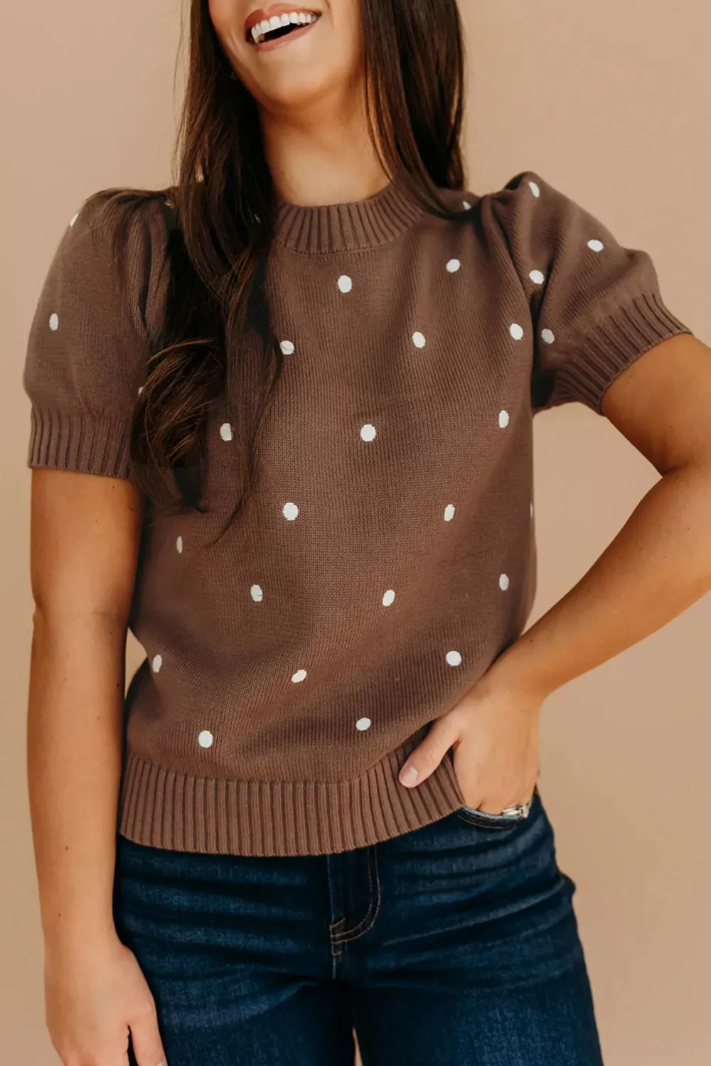 Brown ribbed knit top with short puffed sleeves and white polka dots