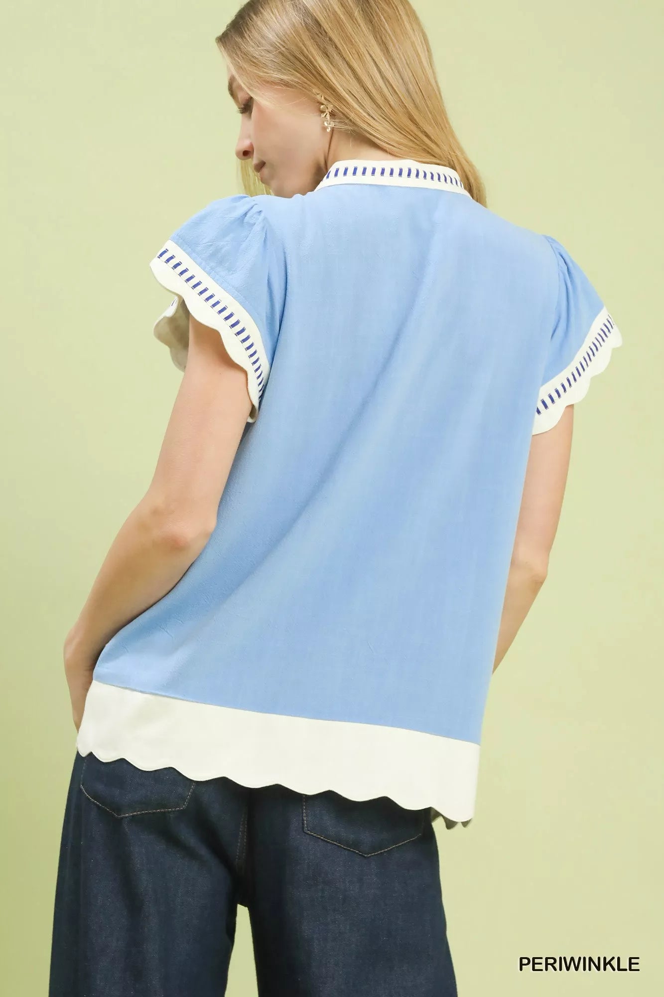 Umgee light blue short-sleeved blouse with white scallop trim and navy dots