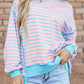 Pastel pink and light blue striped high-low long sleeve sweatshirt