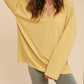 Casey Top: soft ribbed yellow long-sleeved V-neck blouse