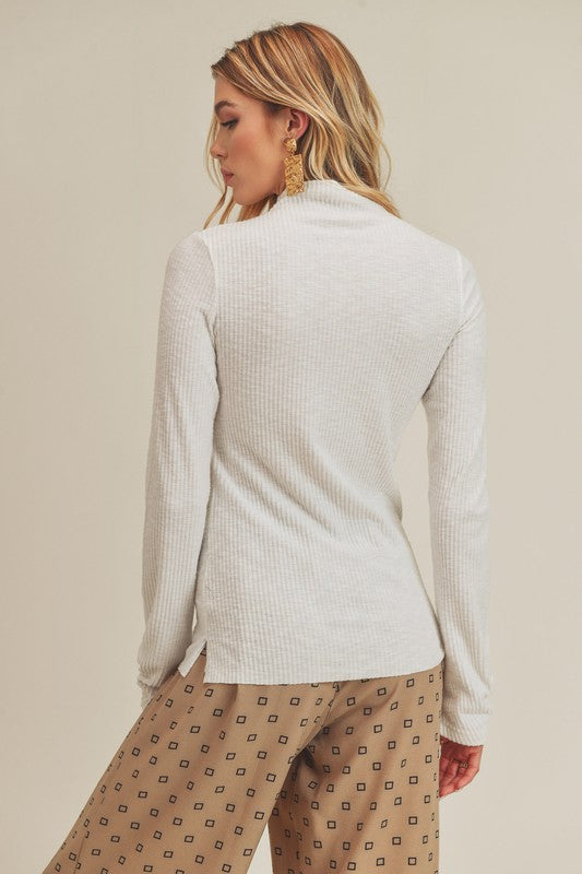 Aemi + Co white ribbed knit mock neck long-sleeve top with side slits