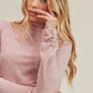 Soft pink ribbed knit Aemi + Co turtleneck dress with ruched cuffs