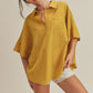 Aemi + Co mustard-yellow ribbed cotton collared top, small