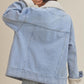 Light blue Aemi + Co denim jacket with white shearling collar and cuffs, large