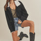 Black Aemi + Co shearling-lined denim jacket with frayed hem, large