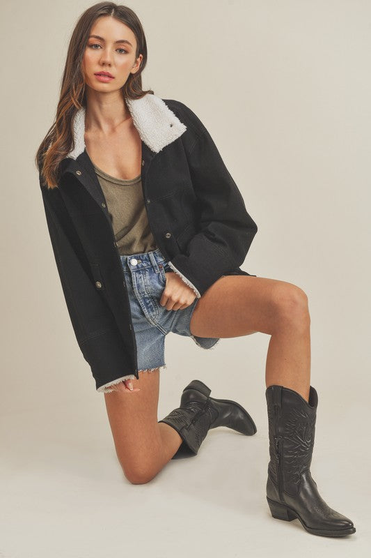 Black Aemi + Co shearling-lined denim jacket with frayed hem, large