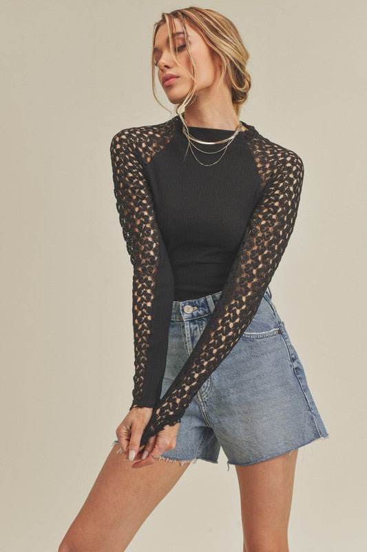 Aemi + Co mock neck knitted lace sleeve top small in black