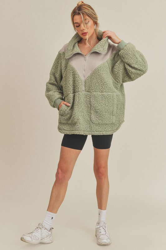 Moss green Aemi + Co. Aspen oversized half-zip fleece pullover with beige chest panel