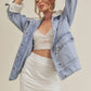 Aemi + Co light-wash denim jacket with white shearling lining
