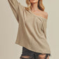 Casey Top: beige ribbed long-sleeve off-shoulder draped blouse